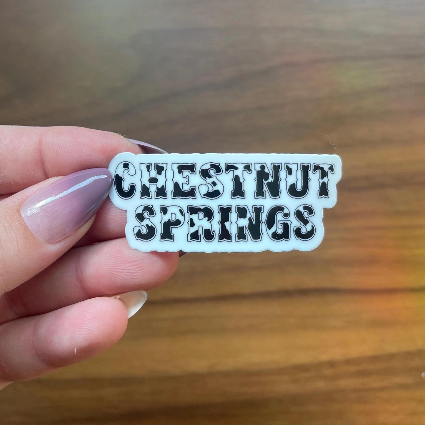 Chestnut Springs Cow Print Sticker