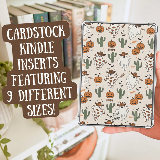 Cardstock Kindle insert with cactus and pumpkin design held by a hand, with text overlay.