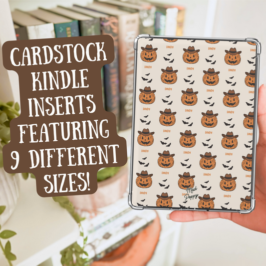 Cardstock Kindle insert with pumpkin pattern held by a hand, with text overlay.