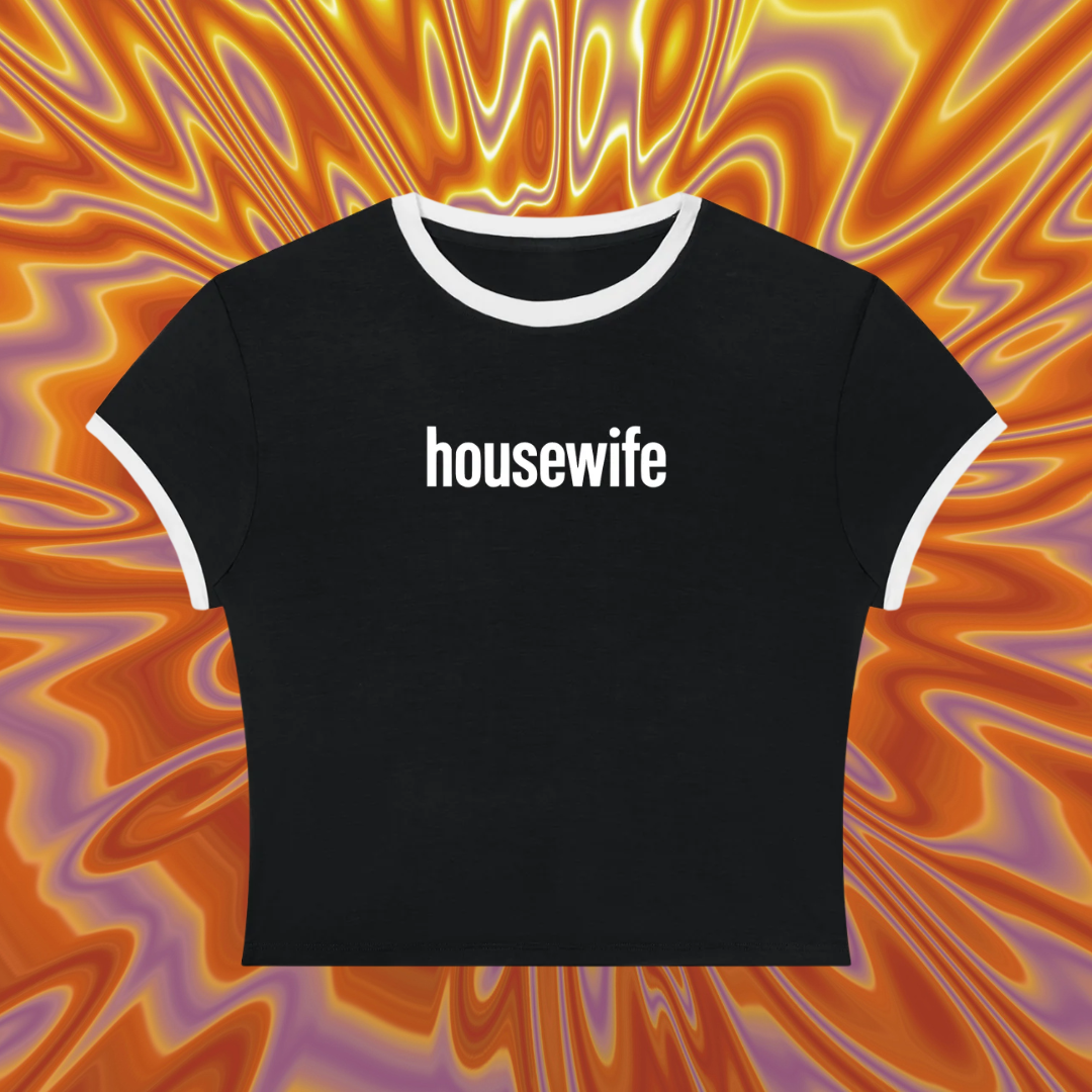 Black t-shirt with 'housewife' text on a colorful abstract background