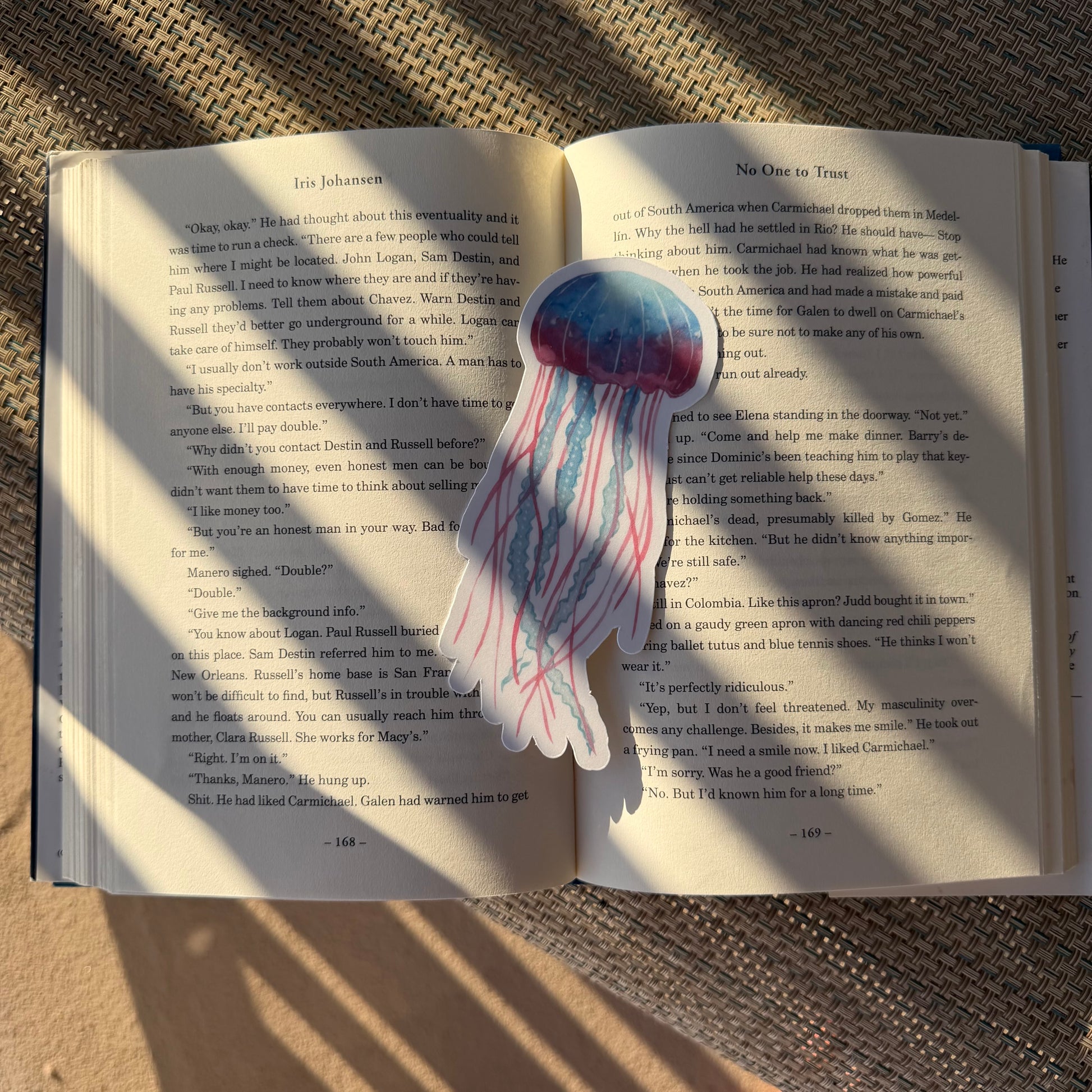 Jellyfish-shaped bookmark on an open book