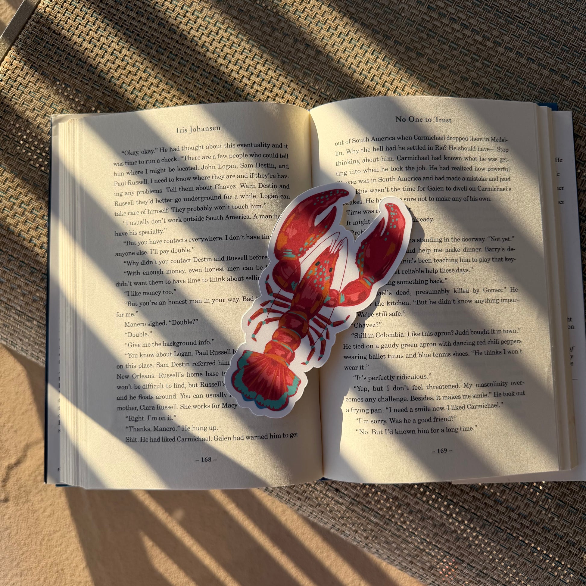 lobster shaped bookmark on an open book