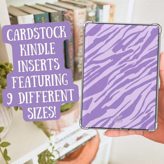 Hand holding a purple zebra-patterned Kindle cover with text about cardstock Kindle inserts.