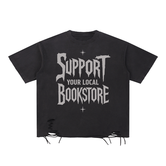 Black t-shirt with 'Support Your Local Bookstore' text on a white background